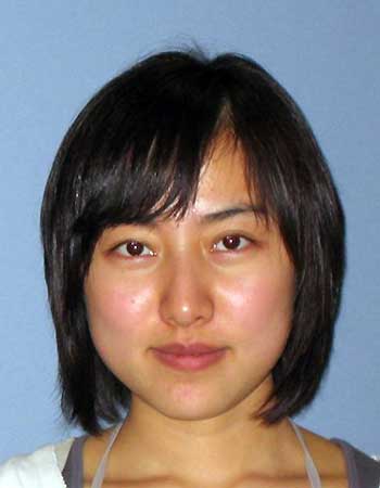 This undated photo provided by Virginia Tech shows the school ID photo of Xin Yang, 22, who was killed Wednesday night after arriving at the campus from Beijing on Jan. 8 to begin studying accounting. Her accused attacker, 25-year-old Haiyang Zhu of Ningbo, China, knew the victim but no motive for the slaying has been determined. 