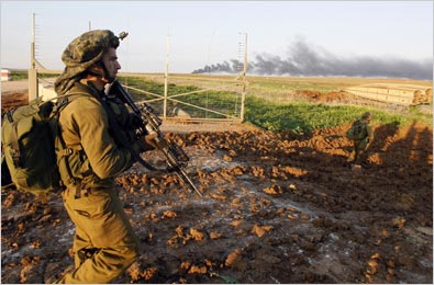 Smoke rose from central Gaza as Israeli soldiers crossed the border on Sunday.