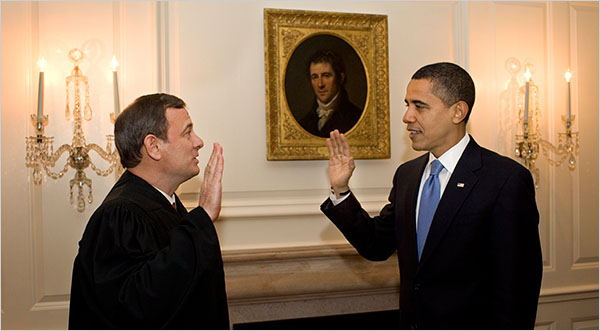 Chief Justice John G. Roberts Jr. re-administering the oath of office to Barack Obama on Wednesday in the White House.